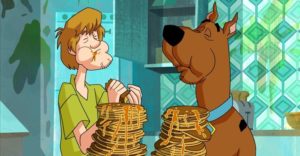 Scooby Doo and Shag eating snacks